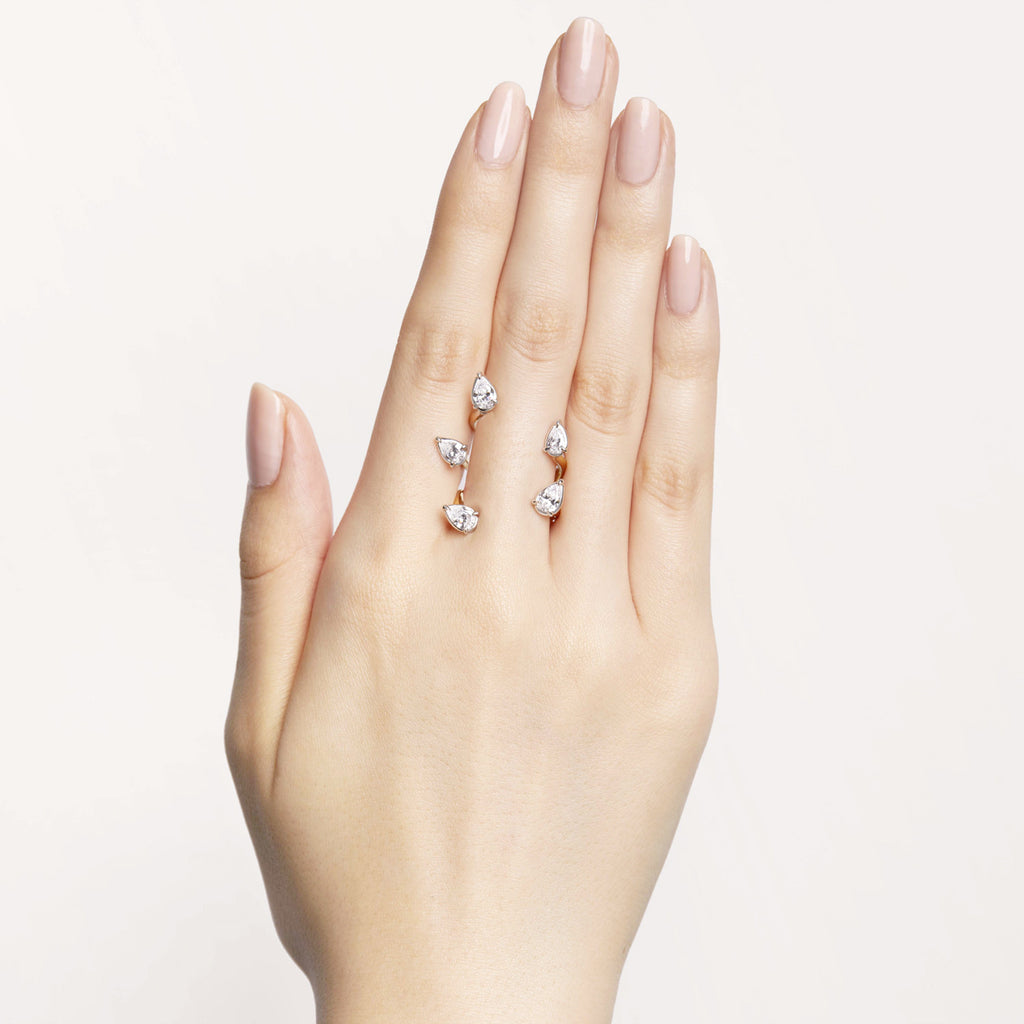 Pear-shaped white diamonds floating cuffs on your skin