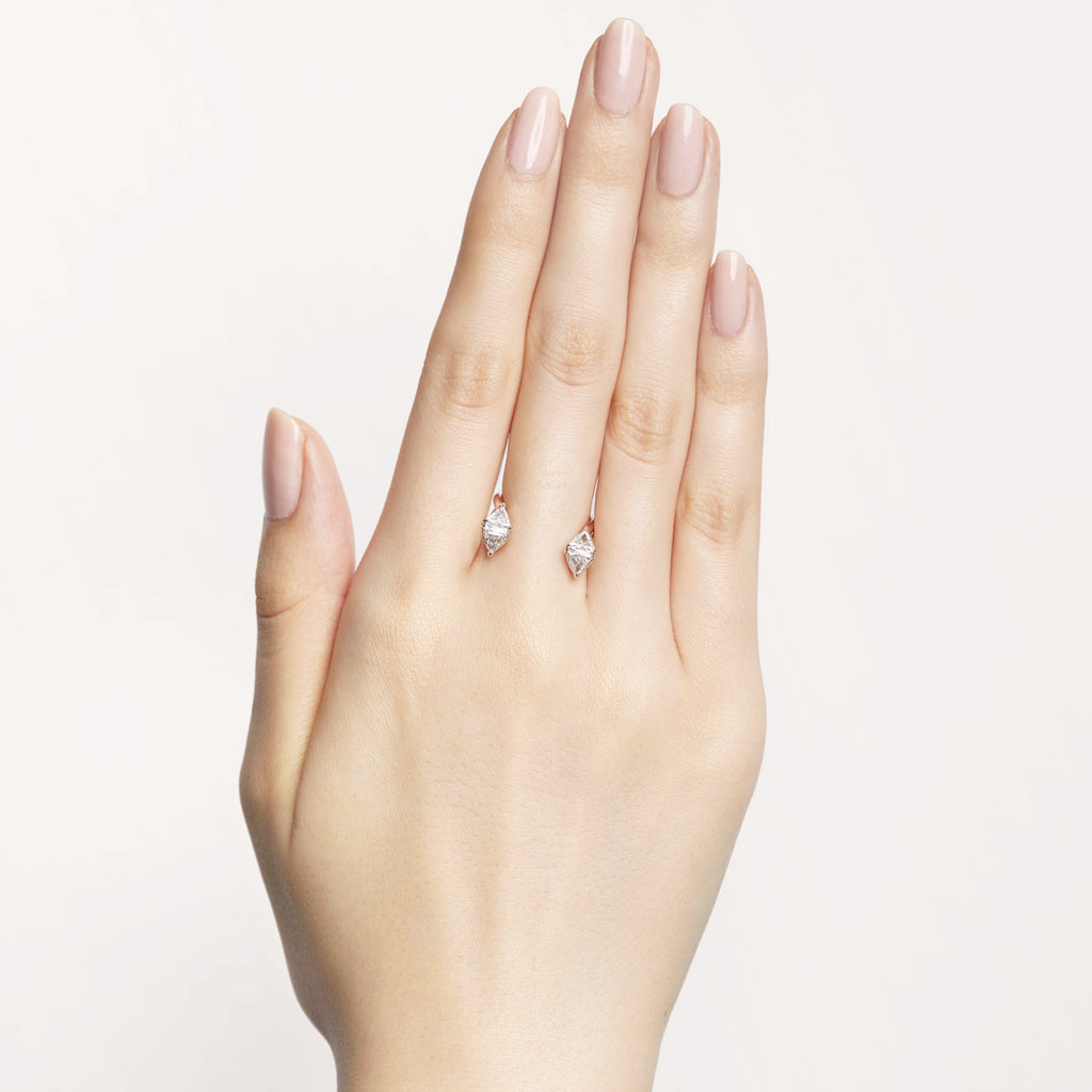 Triangle-shaped white diamonds floating cuffs on your skin